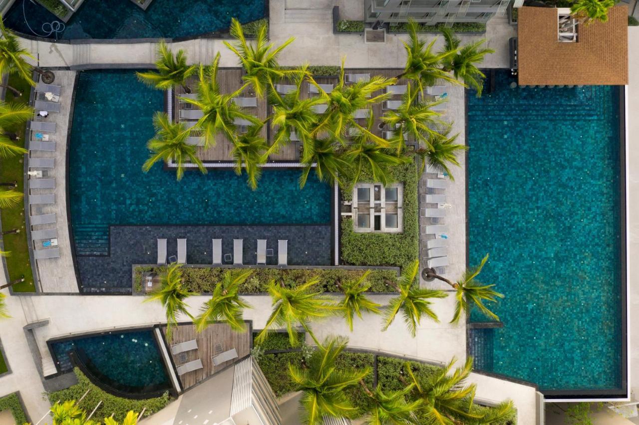 Oceanfront Beach Resort - Sha Extra Plus Patong Εξωτερικό φωτογραφία Aerial view of the pool at the hotel