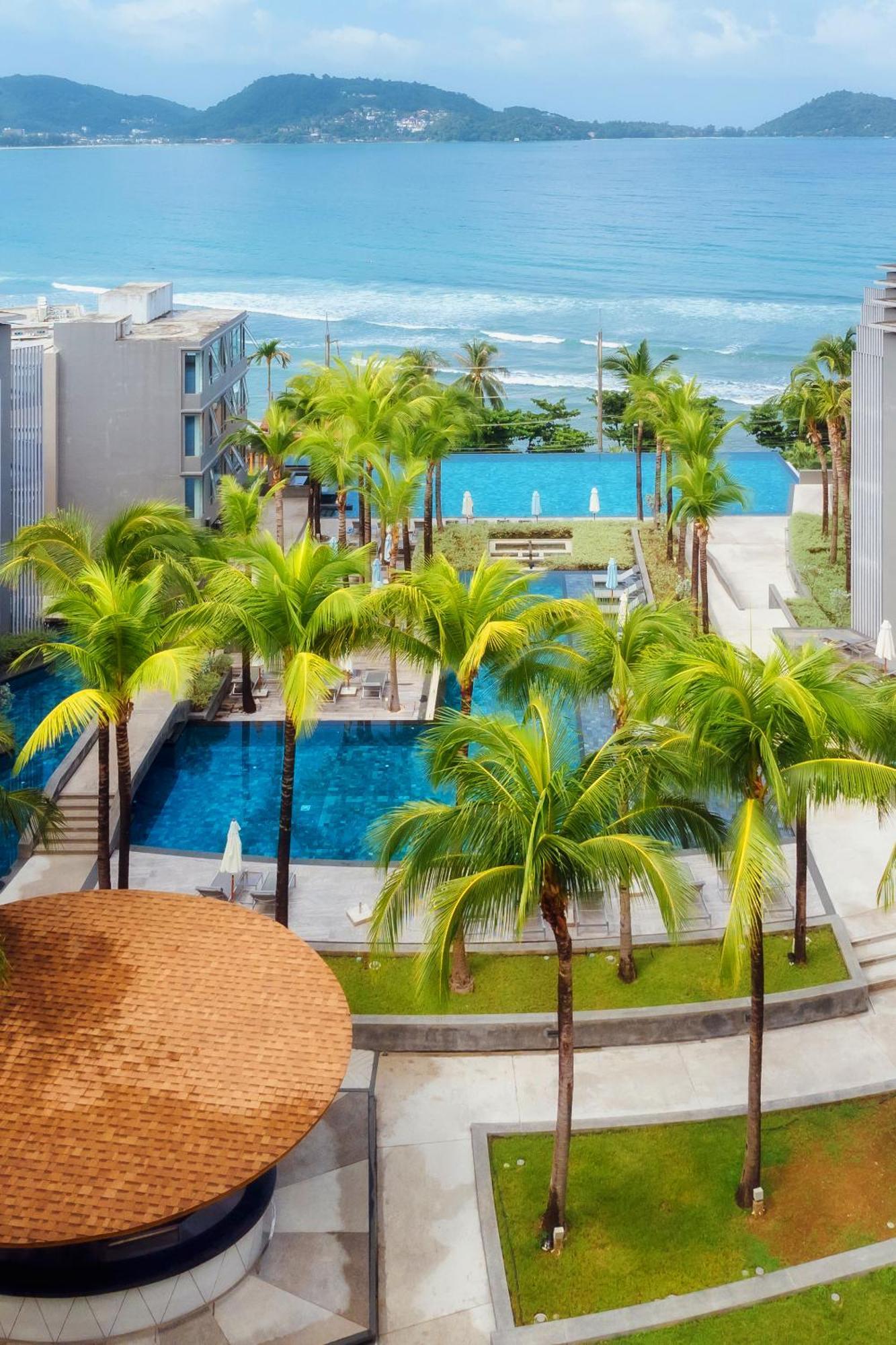Oceanfront Beach Resort - Sha Extra Plus Patong Εξωτερικό φωτογραφία The swimming pool at the resort