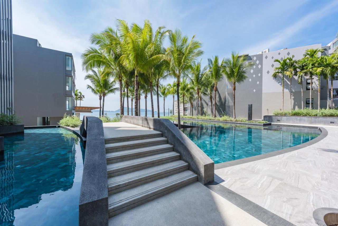 Oceanfront Beach Resort - Sha Extra Plus Patong Εξωτερικό φωτογραφία The swimming pool at the resort