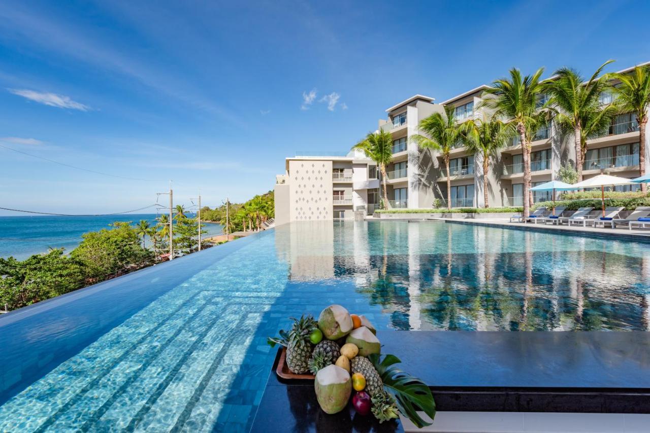 Oceanfront Beach Resort - Sha Extra Plus Patong Εξωτερικό φωτογραφία The resort's infinity pool